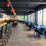 EyeEats dining hall with hanging lanterns